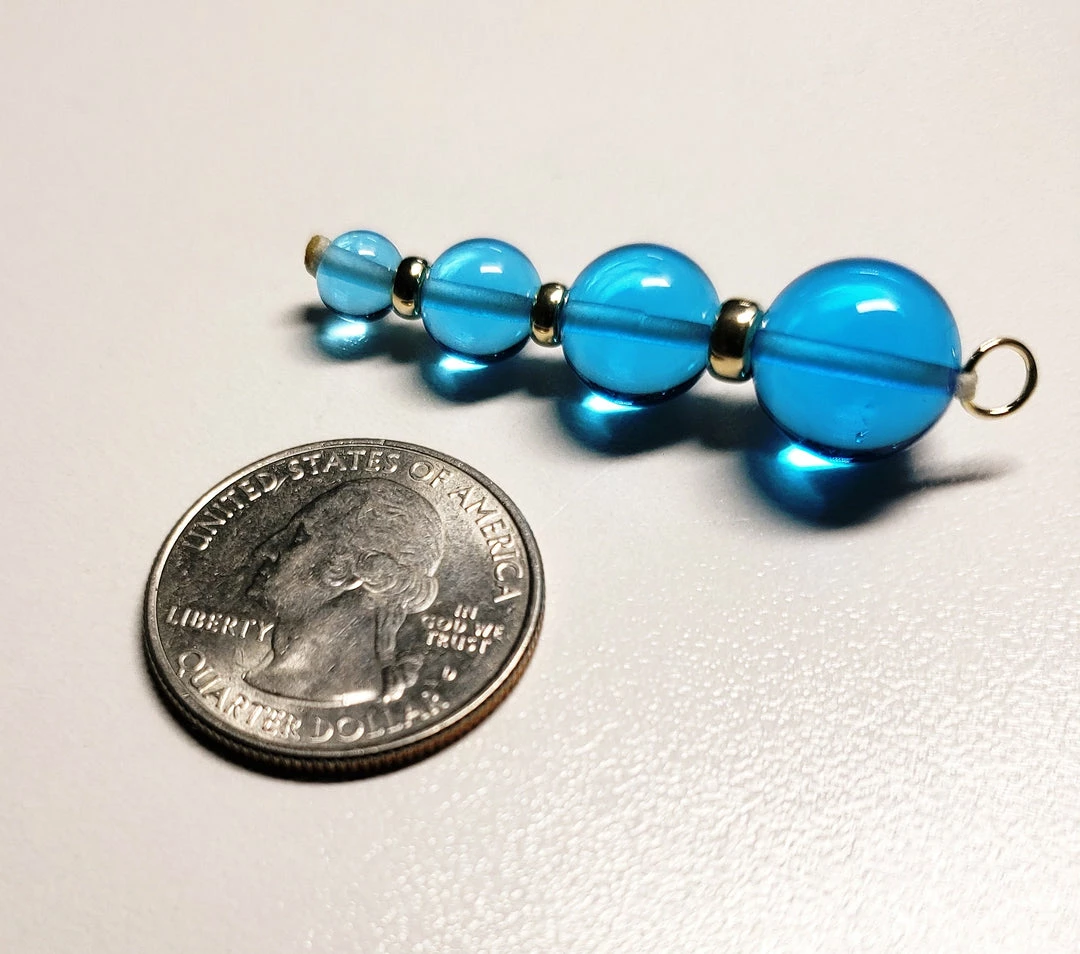 Tools4transformation Pendants Blue - Bright Light Andara Crystal With Gold Pendant (1 X 6-12mm)